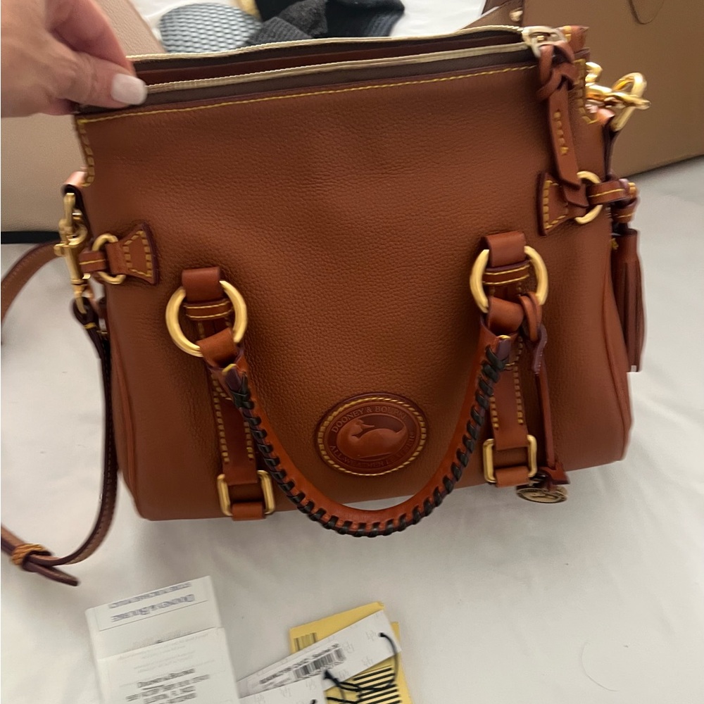Dooney & Bourke all weather Tan Leather Satchel with Gold Accents NWT.